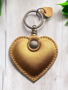 Personalizirani obesek za ključe in torbico www.dddesign.si